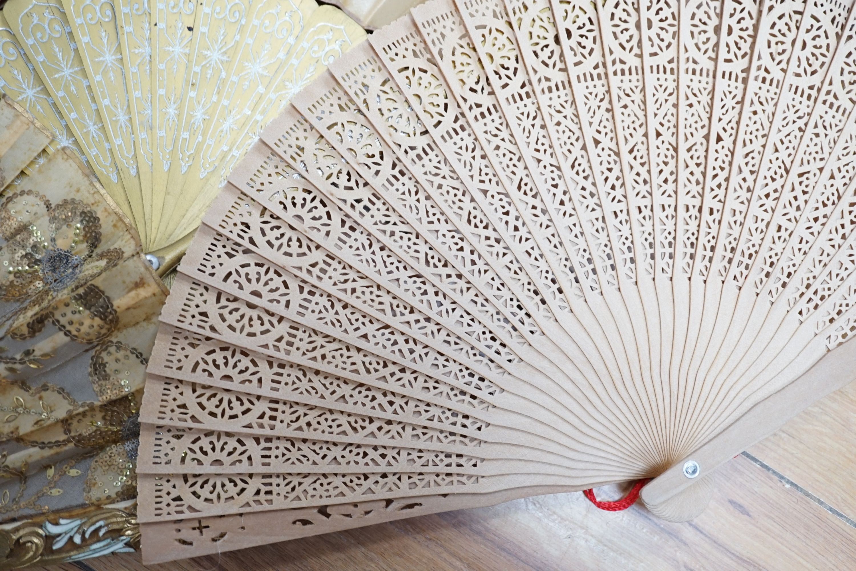 Five various fans, and an 18th century painted leaf fan with ivory chinoiserie decorated guards and sticks, 28 cms high (6)